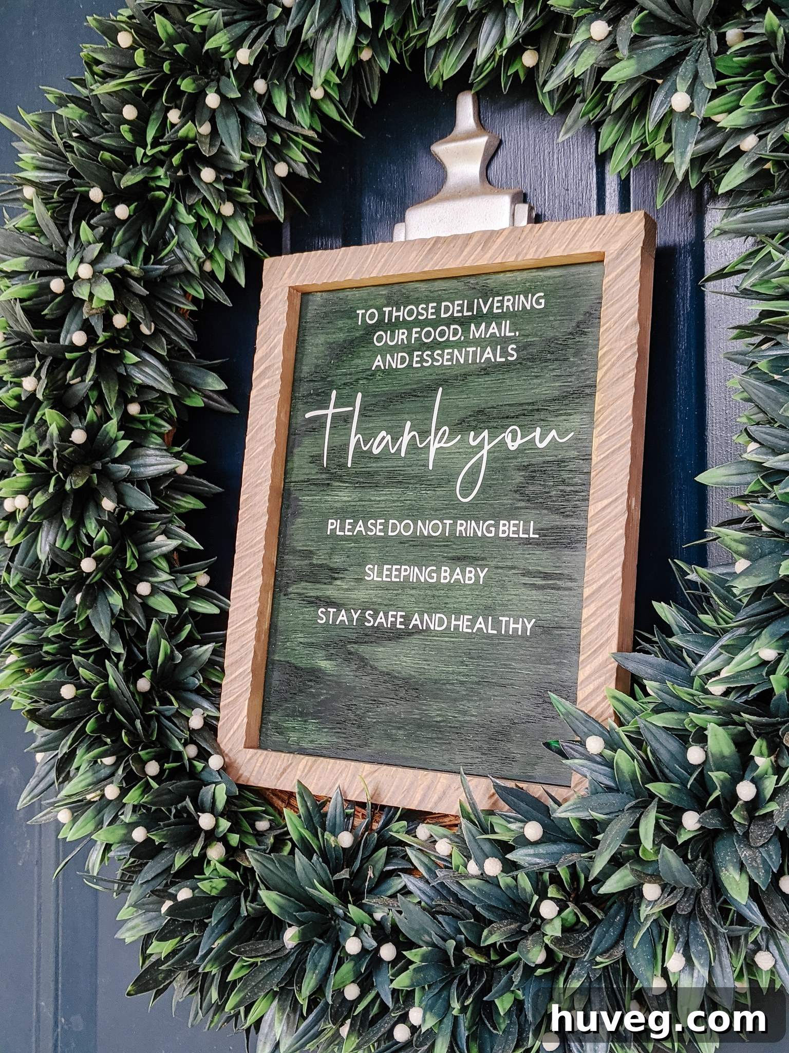 hang the new doorbell sign on the front door