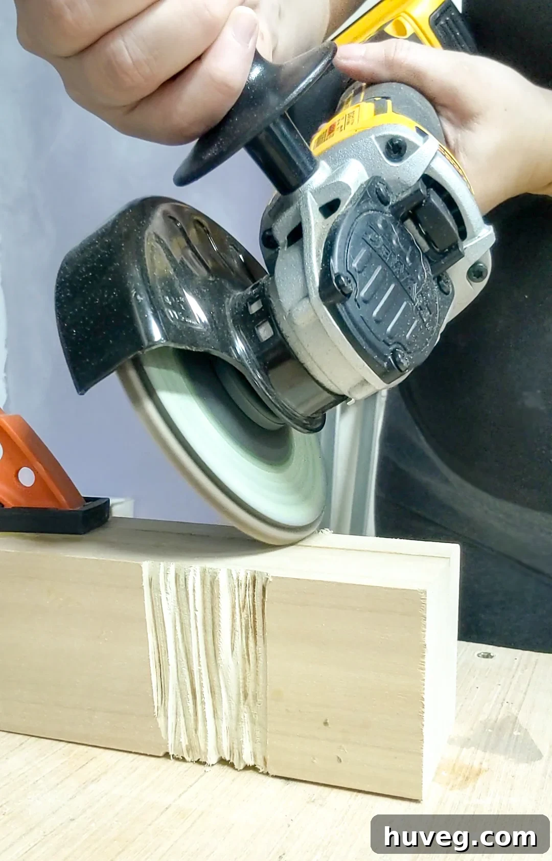 Close-up of a carved wooden candle holder showing texture