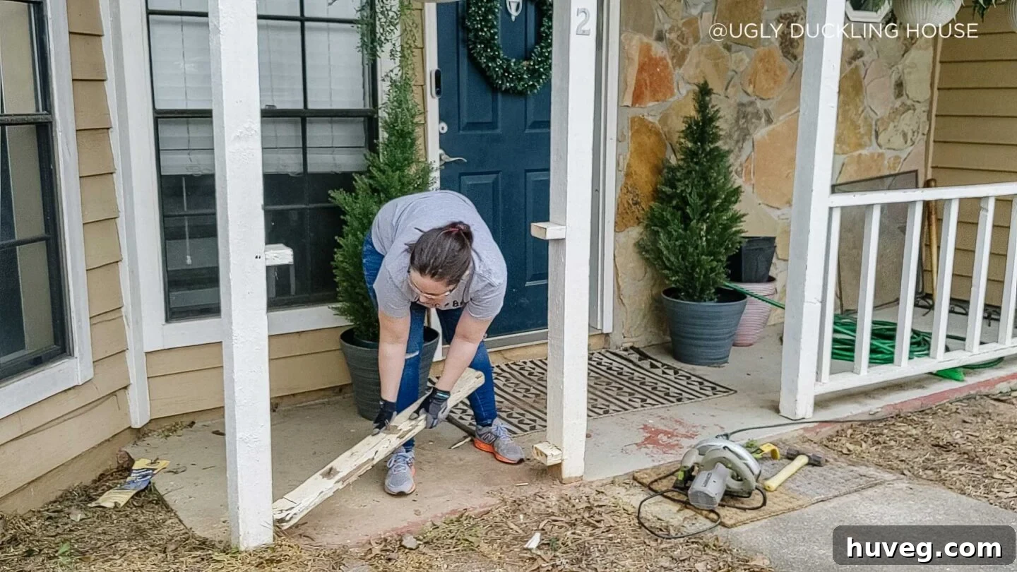 removing-carpenter-bee-damage-in-porch-railing-copyright-Ugly-Duckling-House-2