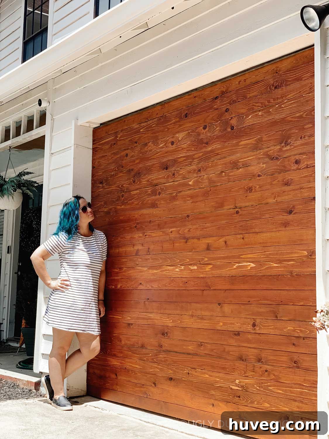 me standing next to my new tongue and groove garage door that I built myself