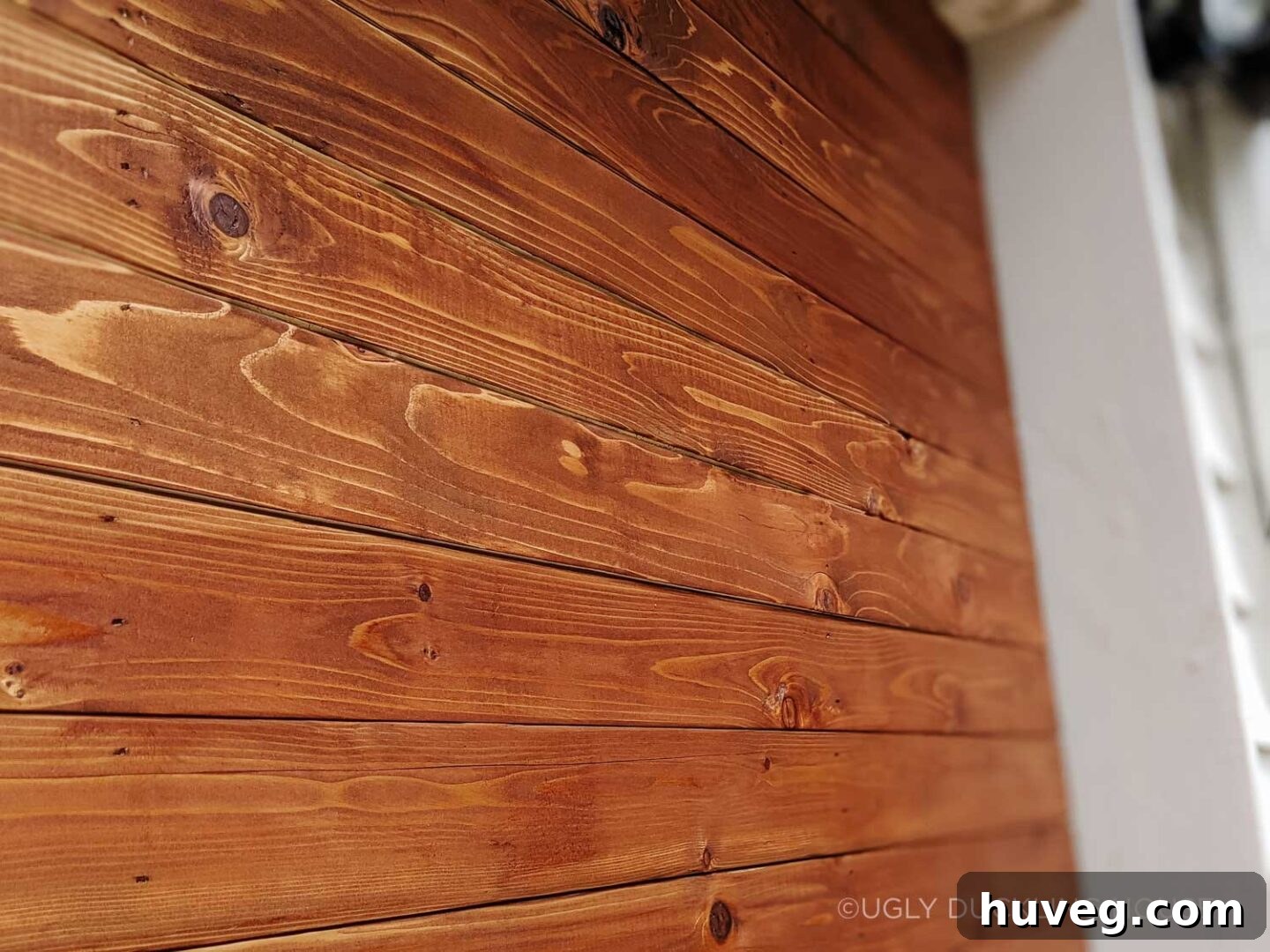 closeup of new stain on new garage door boards