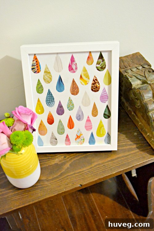Applying Mod Podge to secure magazine raindrop cutouts on canvas, step-by-step process