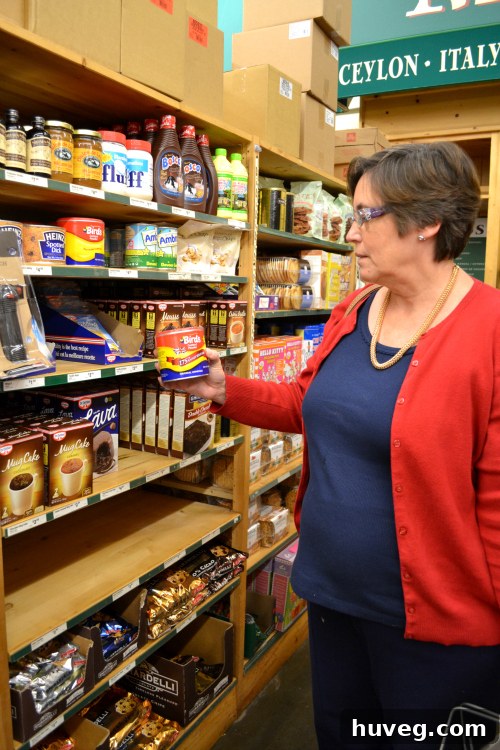 Mom happily shopping in the food aisle at World Market