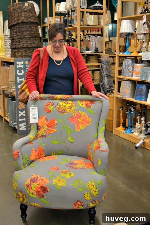 Mom admiring a stylish chair at World Market, contemplating a big win