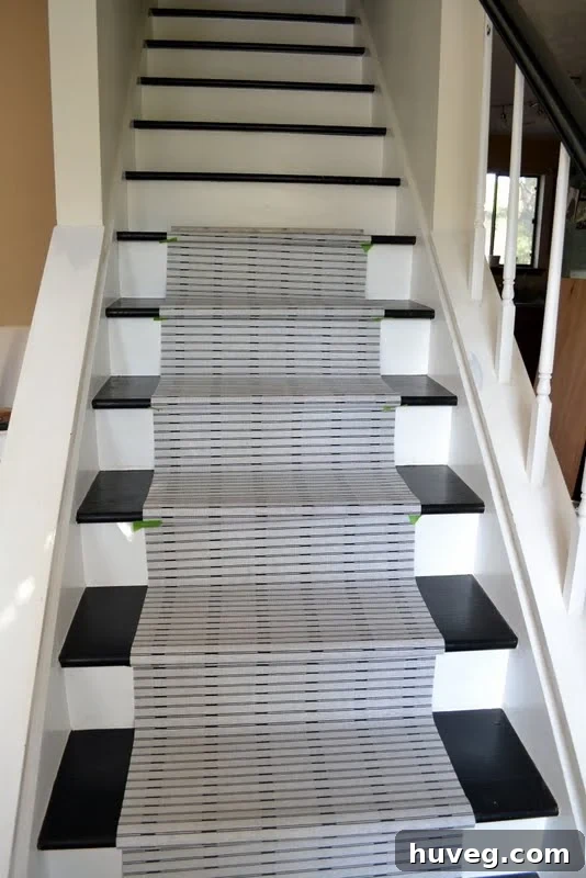 Close-up of stair runner pattern from curtain panels