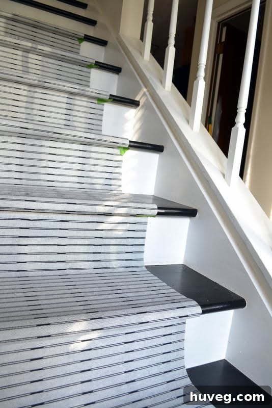 Detailed shot of curtain panel acting as stair runner