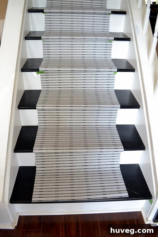 Vertical shot of stair runner pattern with curtain fabric
