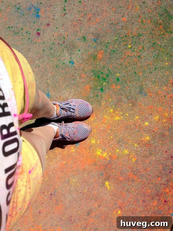Embracing the full spectrum of color post-race at The Color Run, a joyful celebration.