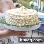 champagne retirement cake with rosemary accent