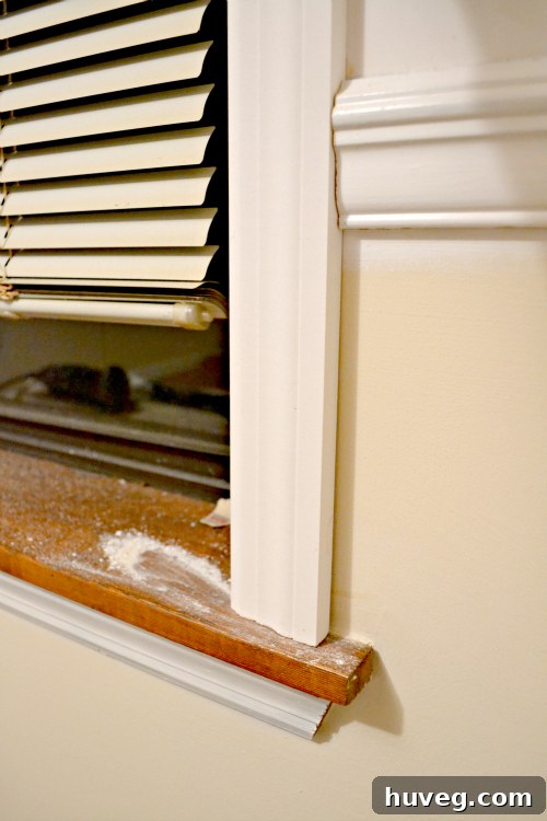 Dry fit of new window trim around dining room window
