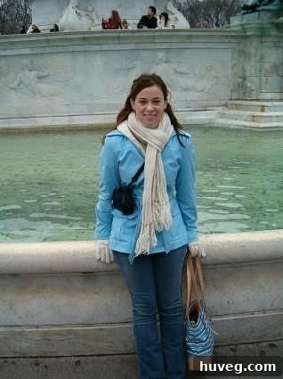 Author enjoying a solo trip in London, bundled up in winter