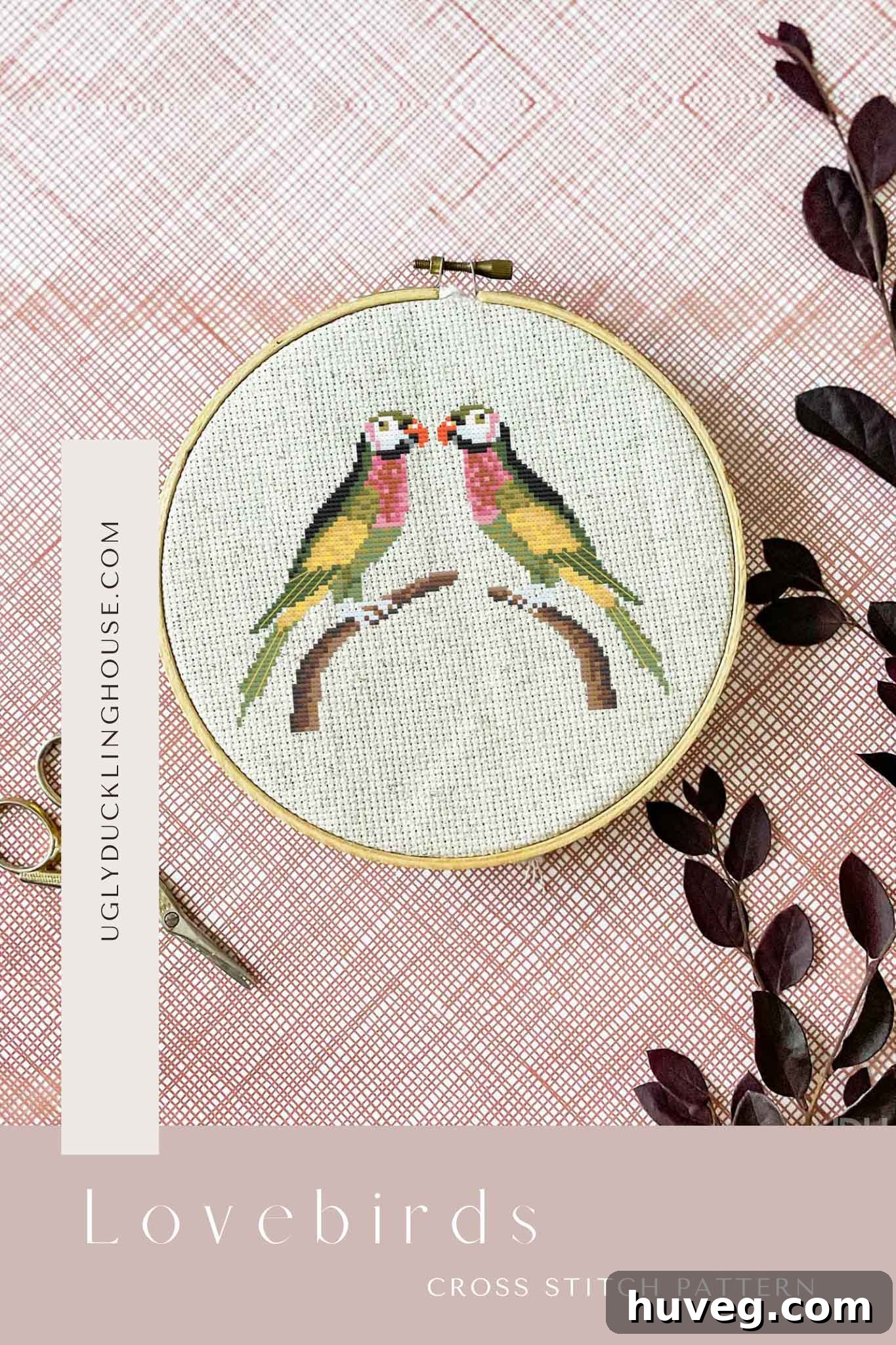 Colorful lovebirds cross stitch pattern, perfect for Valentine's Day and classic embroidery enthusiasts.