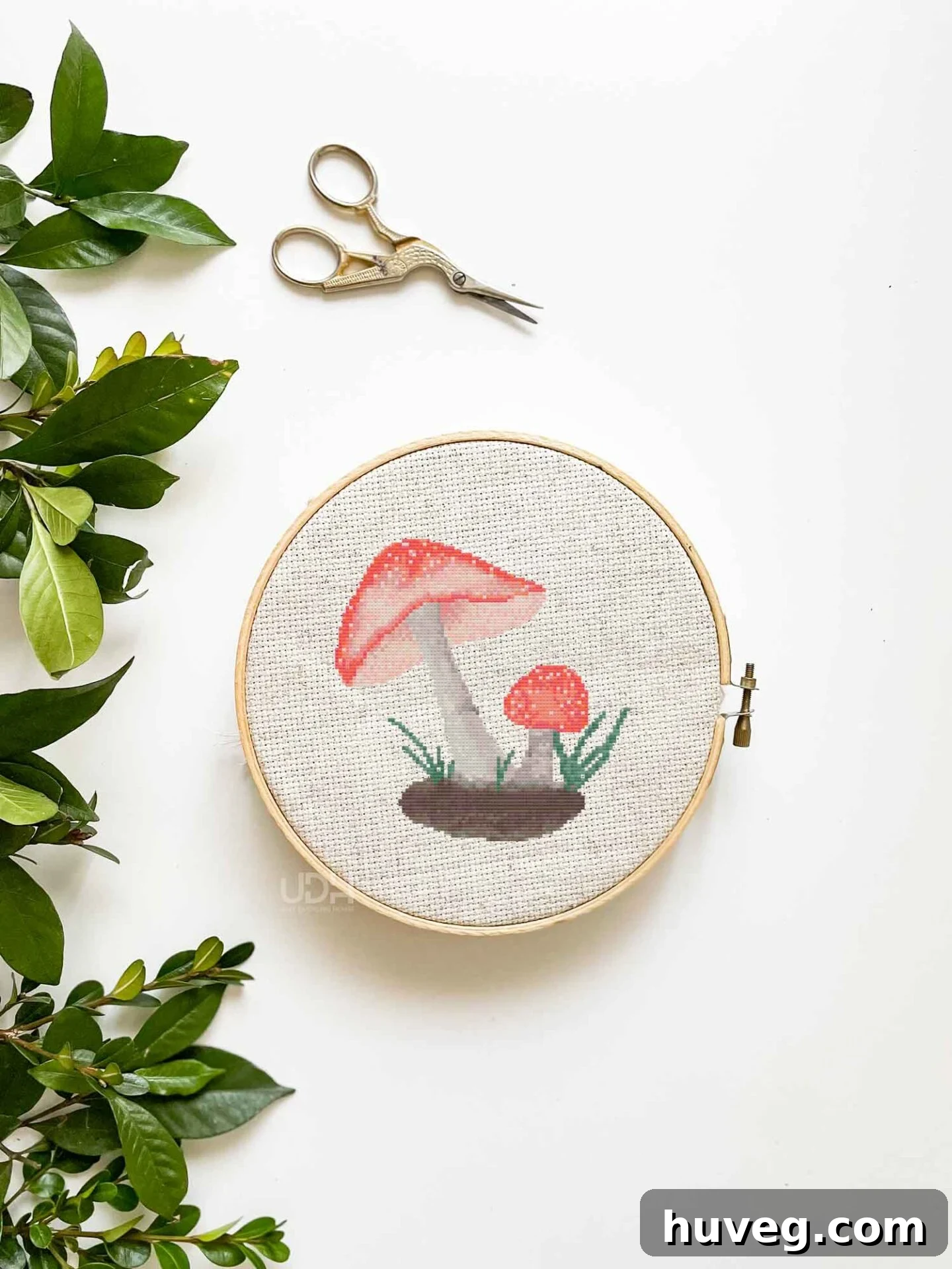 Detailed image of the whimsical Mushroom Cross Stitch Pattern, showcasing its vibrant colors and intricate details.