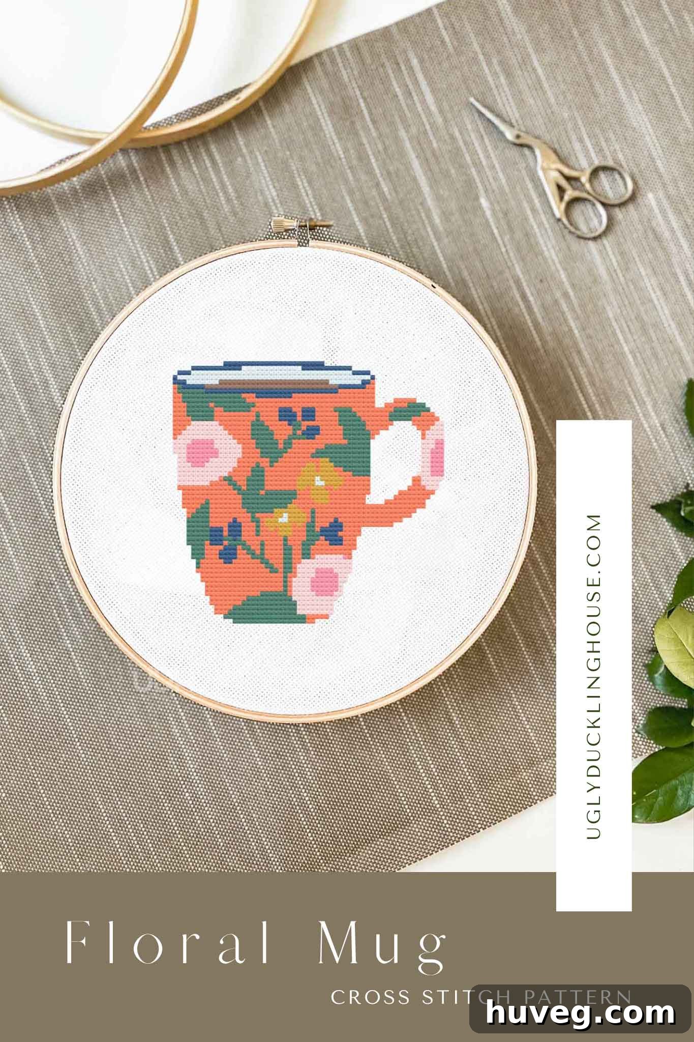 A beautifully rendered floral mug cross stitch pattern, perfect for adding a touch of cozy charm to any home decor. This simple, easy-to-follow, color-block design can be framed as wall art. It features a minimalist color palette that complements various interior styles, including popular desert and southwest aesthetics. Ideal for cross stitch enthusiasts looking for a delightful and quick project. #crossstitch #embroidery #wallart #desertdecor #southweststyle #cactus