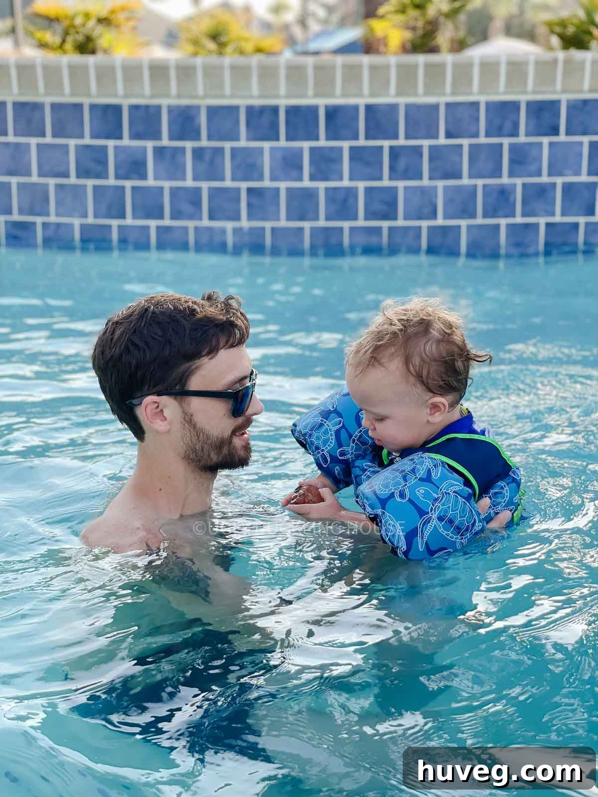 Kyle and Ellis in the pool at the beach