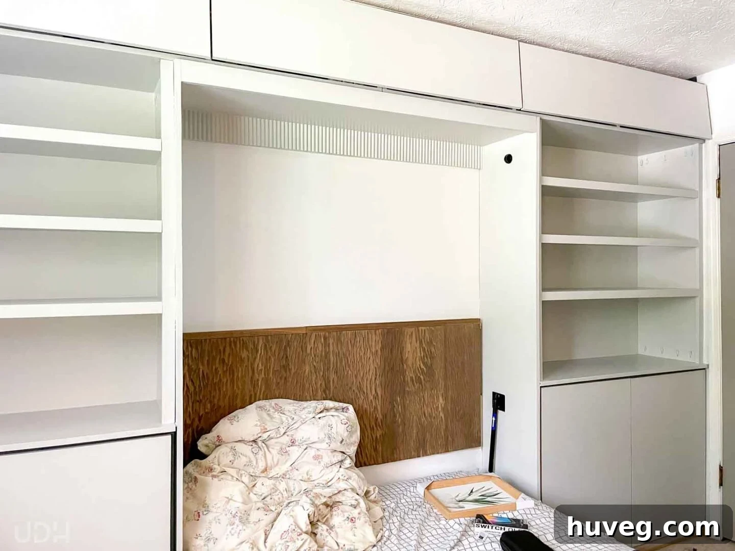 finished gray guest room built ins with Murphy bed