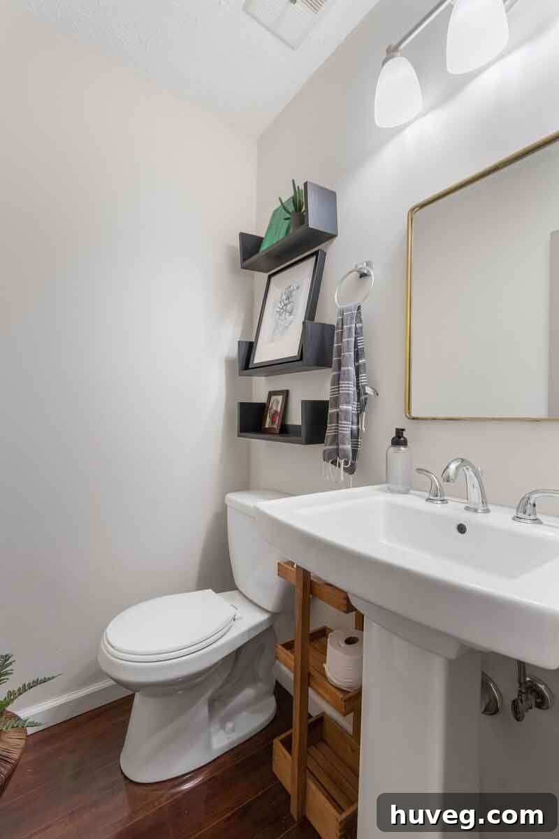 first floor powder room with floating shelves