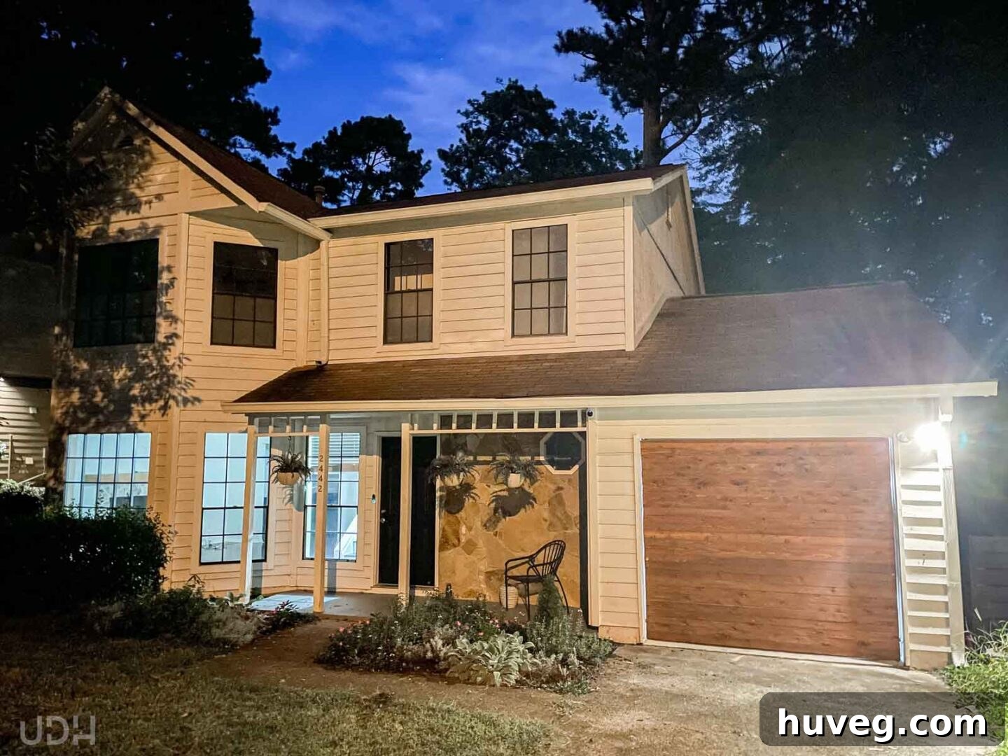 A poignant nighttime photograph of our first house, capturing its quiet beauty on the very last evening of our ownership.