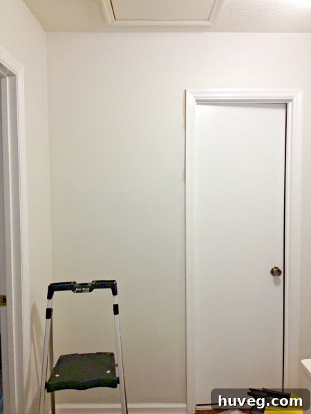 Brightly painted hallway view towards a door
