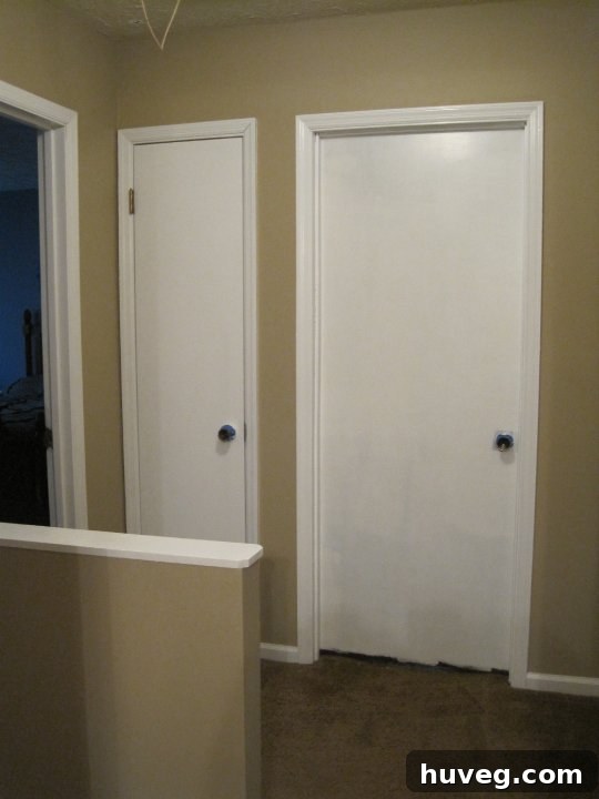 Dark, dated hallway before renovation