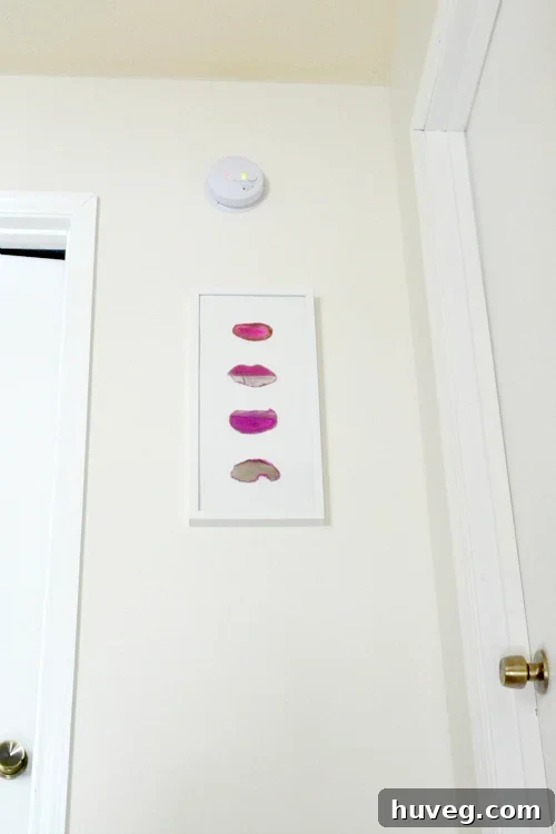 View of the agate slice wall art positioned perfectly in the stairwell, enhancing the home's ambiance.