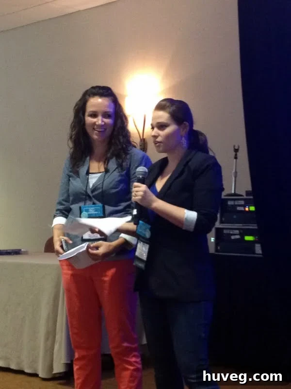 Sherry from Young House Love and Katie from Bower Power sharing a candid moment in a tight space