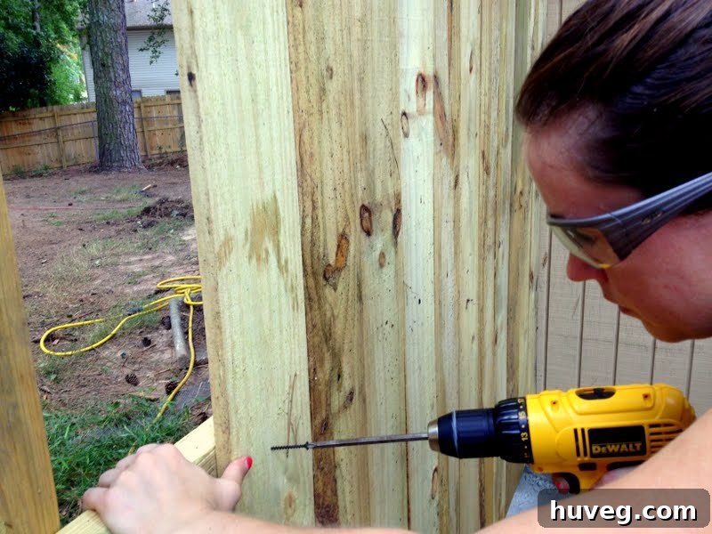 how to install a wooden fence for backyard privacy