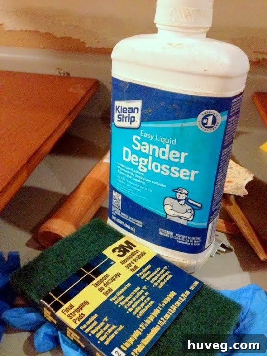 Klean-Strip Easy Liquid Sander/Deglosser in use on kitchen cabinets, preparing surfaces for paint.