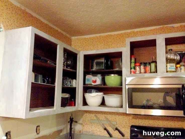 Transformed kitchen cabinets, primed efficiently and effectively