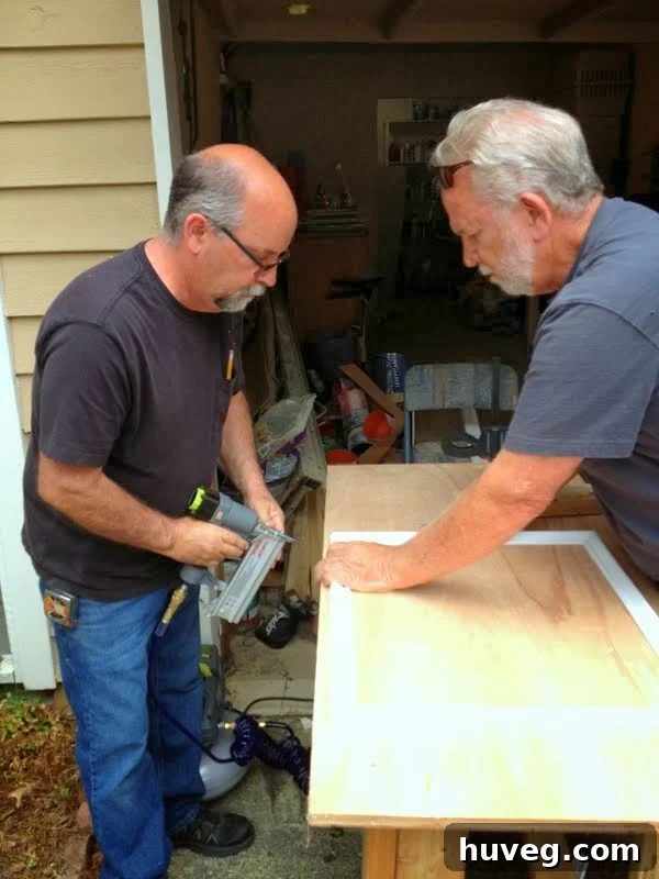 Assembled picture frame molding box on a flat surface