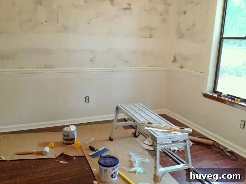 Primed dining room wall, ready for picture frame molding