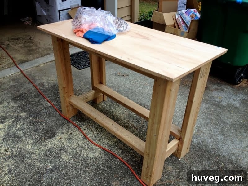 Newly completed DIY workbench in an organized garage space