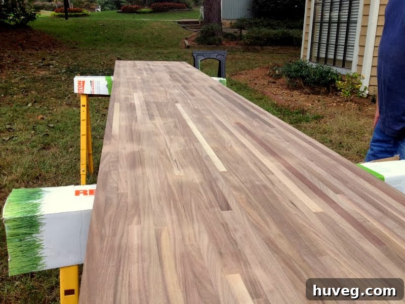 Walnut butcher block countertops revealed in the front yard