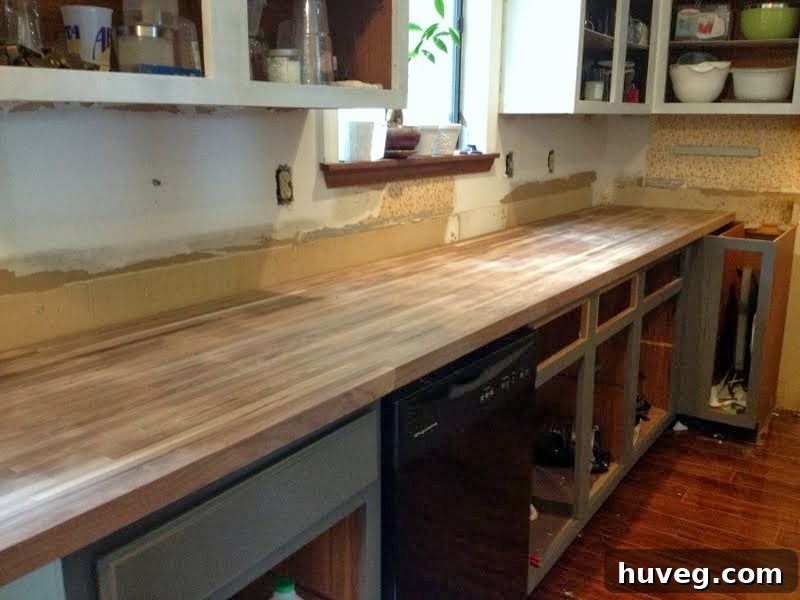 Dry fit of walnut butcher block countertops in the kitchen