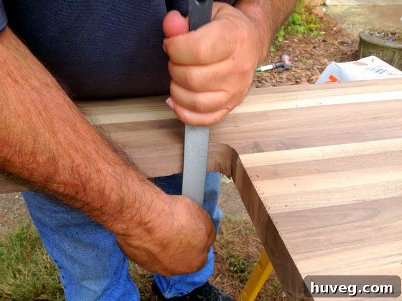 Filing the sink hole for a smooth finish