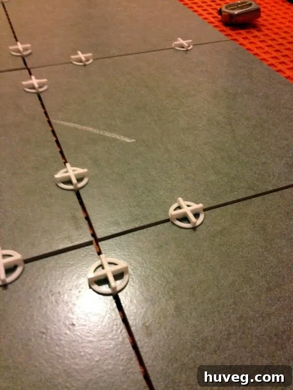 Planned tile layout over Ditra for concrete subfloor