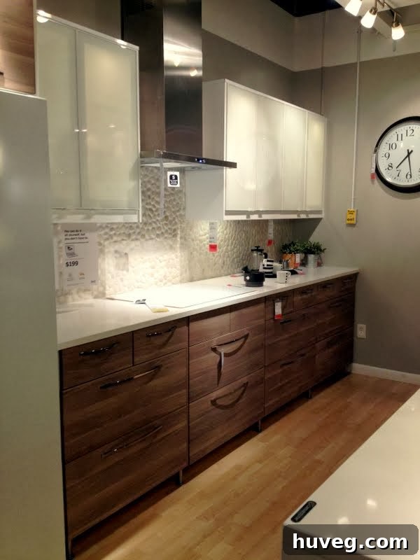 IKEA kitchen display with a unique pebbled backsplash