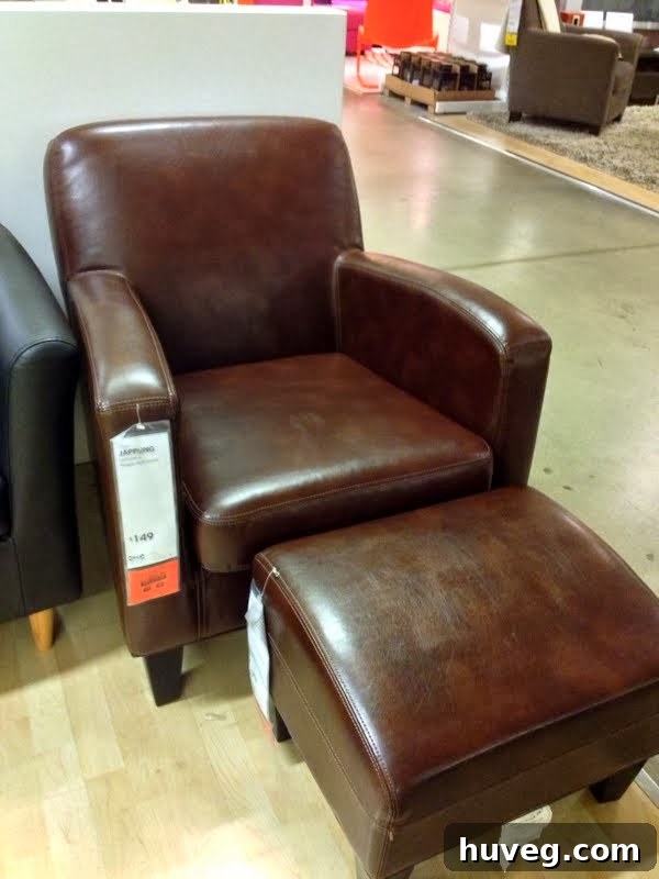 Matching IKEA armchair and footstool with modern design