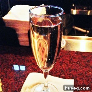 A close-up of a sparkling glass of champagne, signifying celebration.