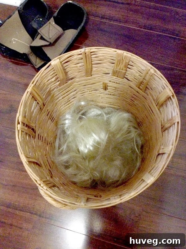 Before and after image of the trash can, possibly showing the wig inside or the trash can itself before being placed in the laundry room