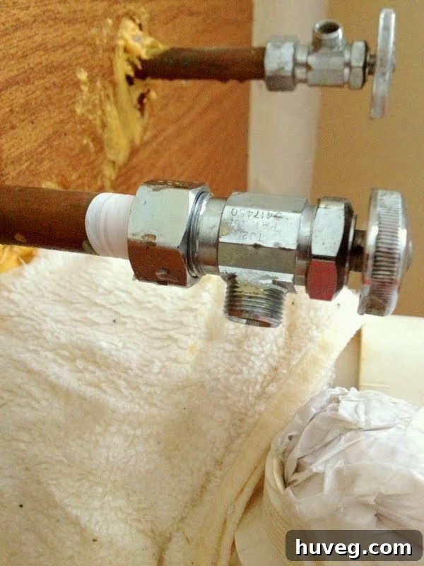 Leaking valve wrapped with towel