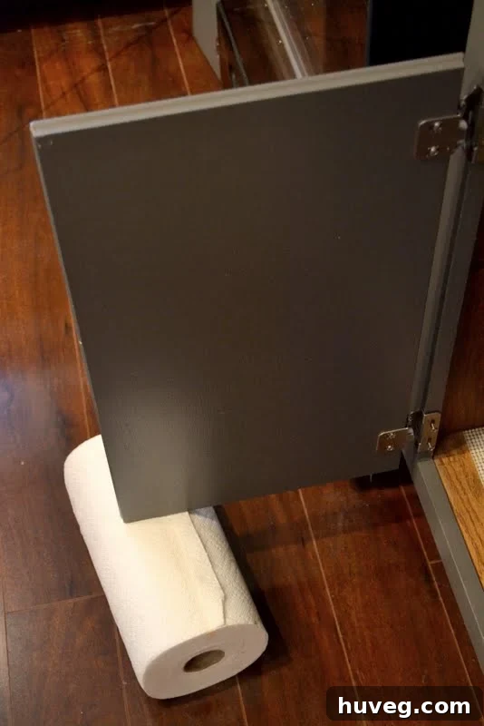 steady cabinet doors with paper towel rolls