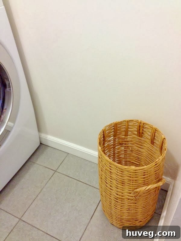 Before shot of a plain thrift store basket ready for a DIY makeover.