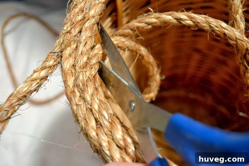 Finished top edge of a rope-wrapped basket, showing the created decorative lip.