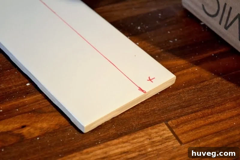 Marking ceramic tile for cuts around electrical outlets