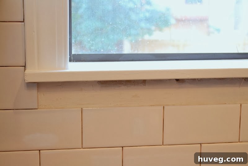 Strategy for tiling around kitchen windows and window trim