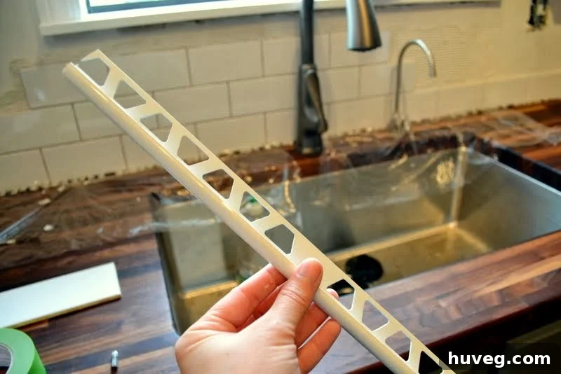 Options for neatly finishing exposed tile backsplash edges