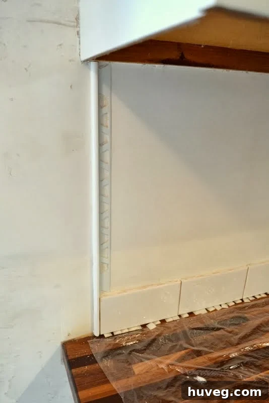 Close-up of modern tile edging trim for a clean backsplash finish