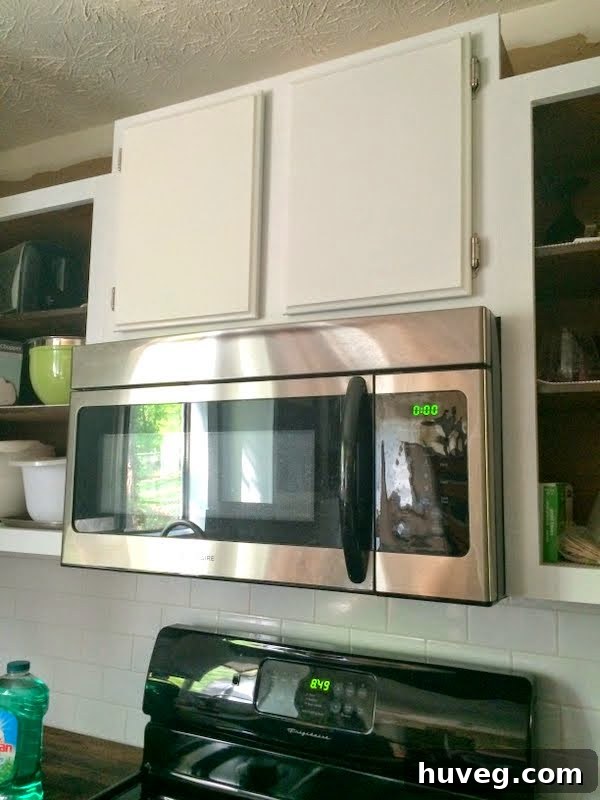 Finished upper cabinet doors, proudly installed