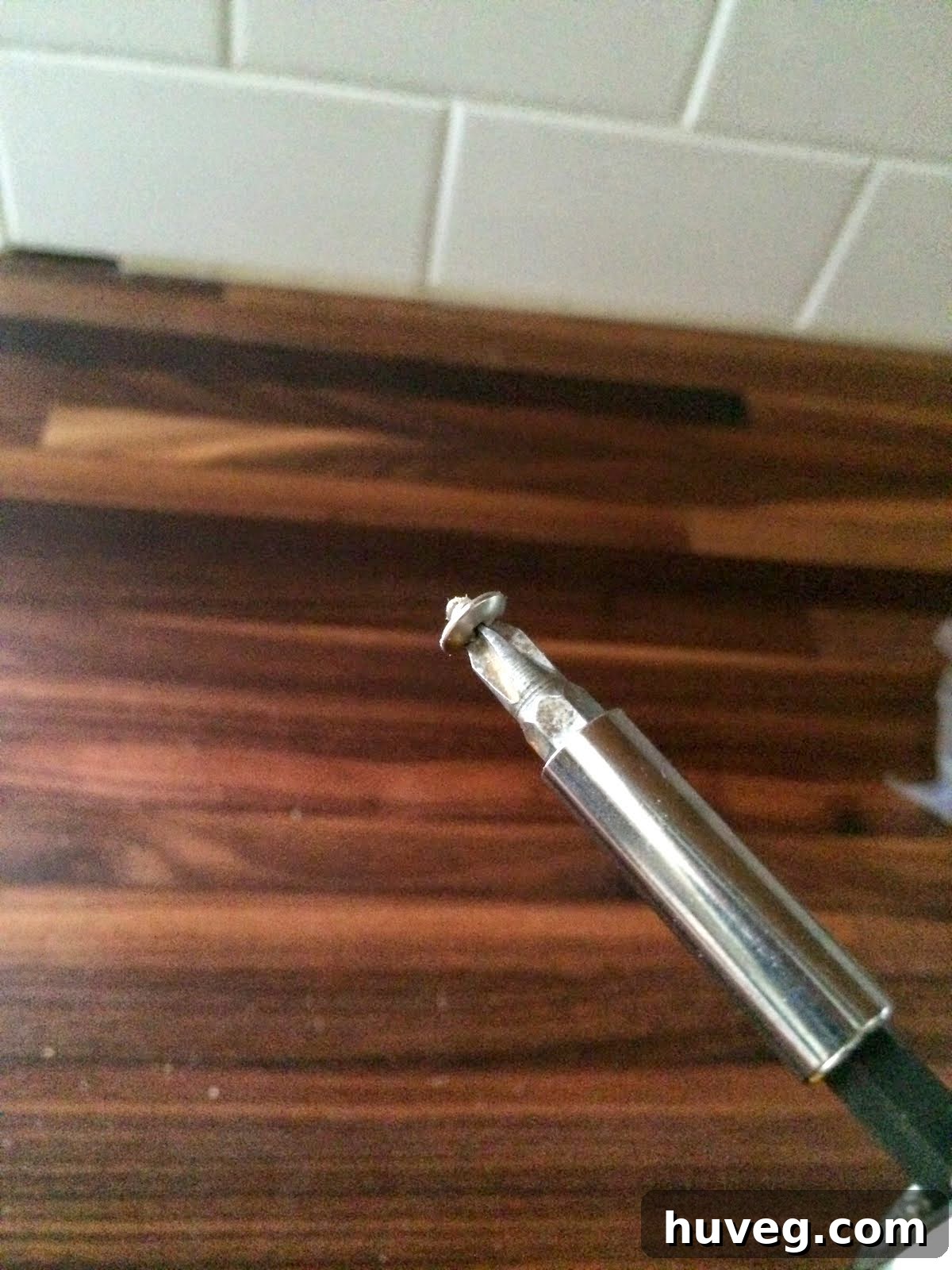 A broken screw, a common frustration in DIY projects.